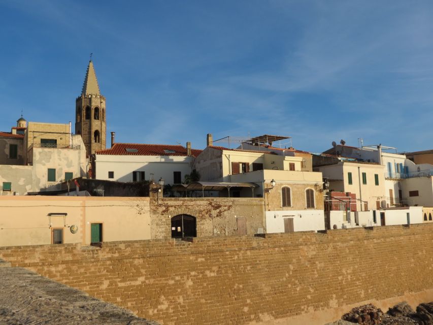 Alghero: Historic Center Walking Tour with A Local Guide - Aragonese towers and the defensive walls