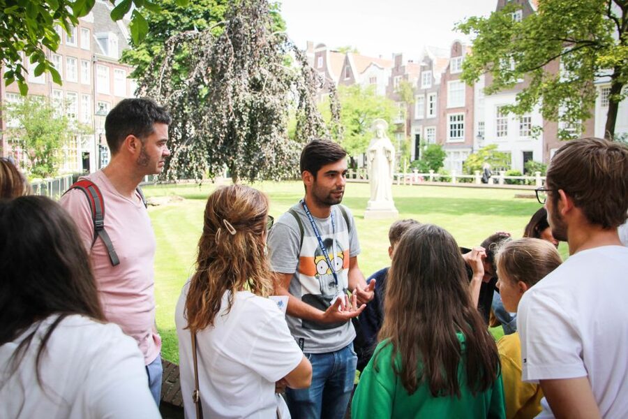 Amsterdam Small-Group Walking Tour - Beursplein and Dam Square: starting with Amsterdam’s public face