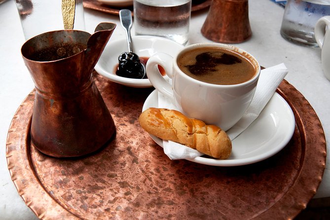Athens Authentic Greek Food Walking Tour (Small Group) - Monastiraki mixes food, ruins, and city noise