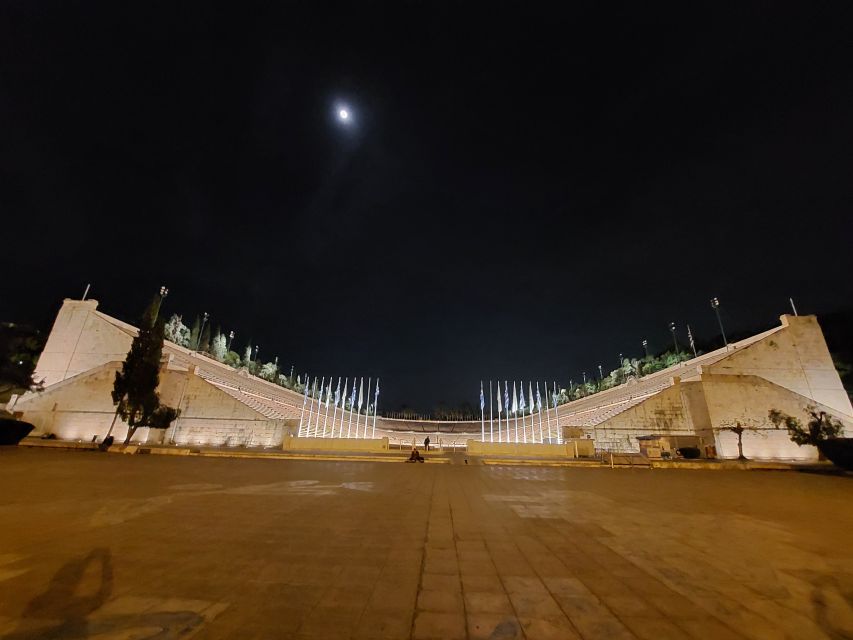 Athens: City Highlights Nighttime Walking Tour in Spanish - Panathenaic Stadium after sunset