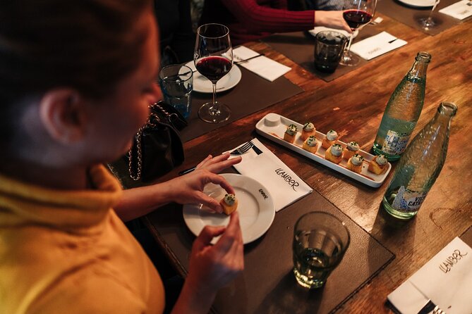Barcelona: Guided Food Walking Tour with Tapas and Wine - Carrer Ample: Croquettes, Bravas, and Pimientos