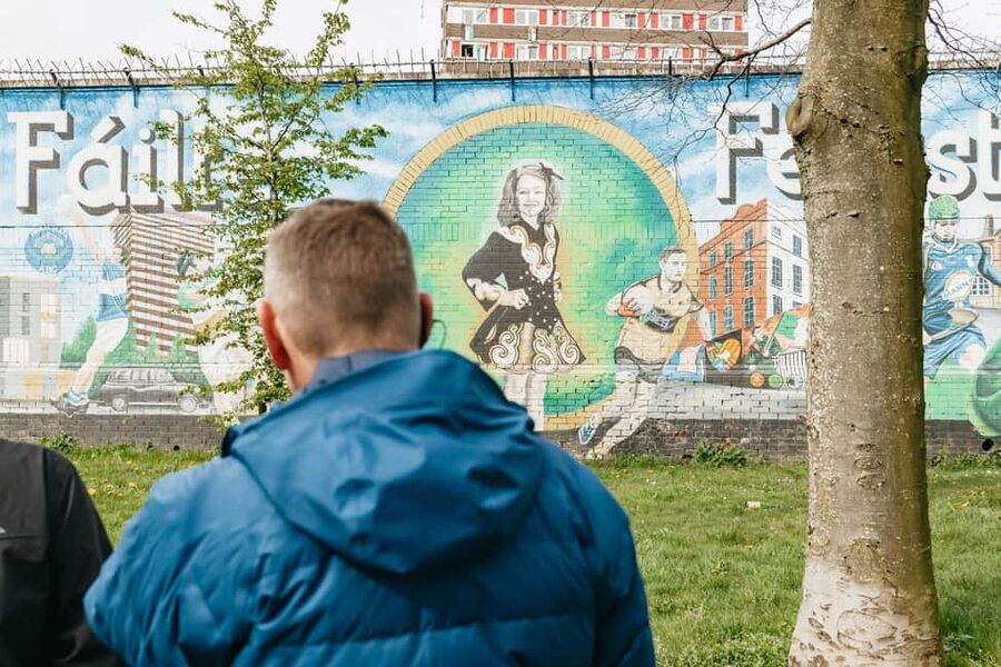 Belfast: The Troubles Walls & Bridges Guided Walking Tour - Passing through gates into the Shankill area