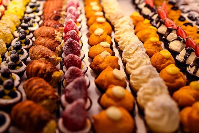 Bologna Food & Market Tour with 6 Tastings, Pasta, Wines & More - Parmigiano Reggiano, cold cuts, and the practical side of shopping