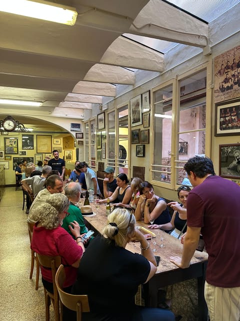 Bologna: Walking Food Tour and Highlights with a Local Guide - Mortadella, bread, and wine in Vicolo Ranocchi