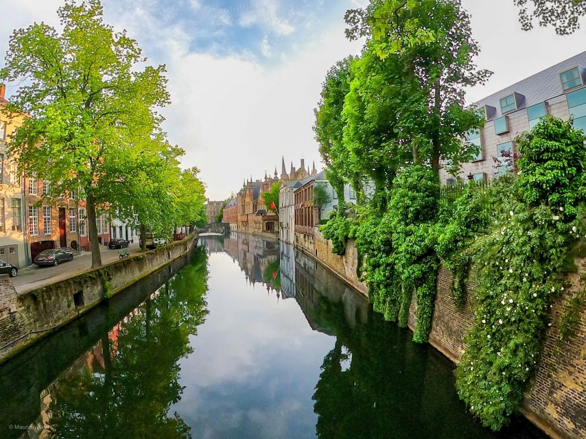 Bruges: Private Historical Highlights Walking Tour - Burg Square, churches, and grand medieval buildings