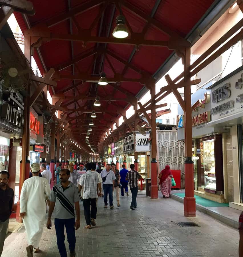 Dubai: Old City Walking Tour with Abra Ride - Al Fahidi and Bastakiya: wind towers and narrow lanes
