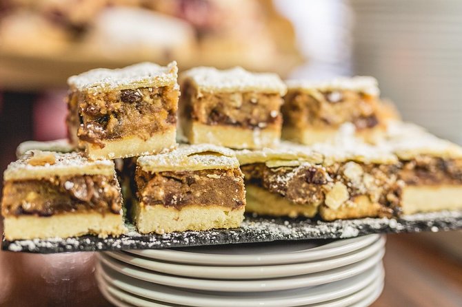 Dublin Historical Centre Food Tour with 8 Food Tastings & Drinks - Irish and international cheese in a restaurant setting