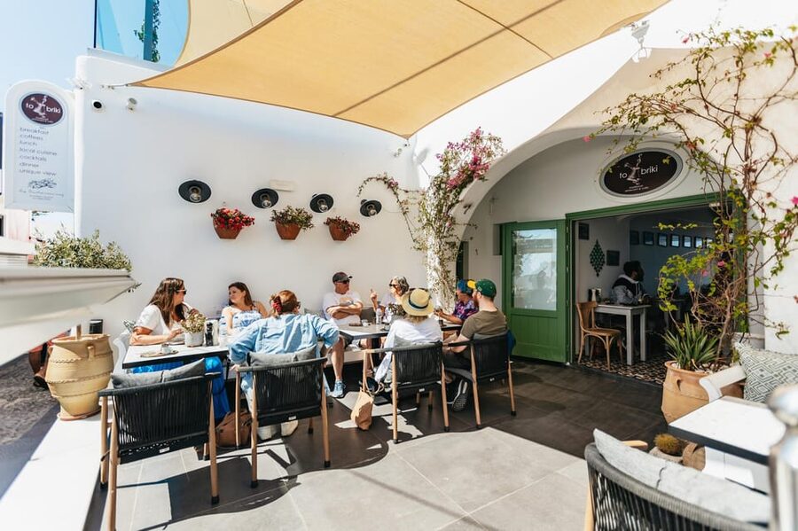 Fira: Guided Foodie Walking Tour with Tastings - What your guide adds to the day
