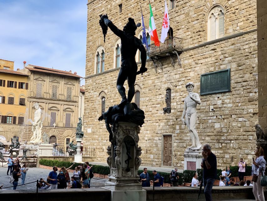 Florence: Highlights Walking Tour with Expert Guide - Piazza della Signoria and the public face of power