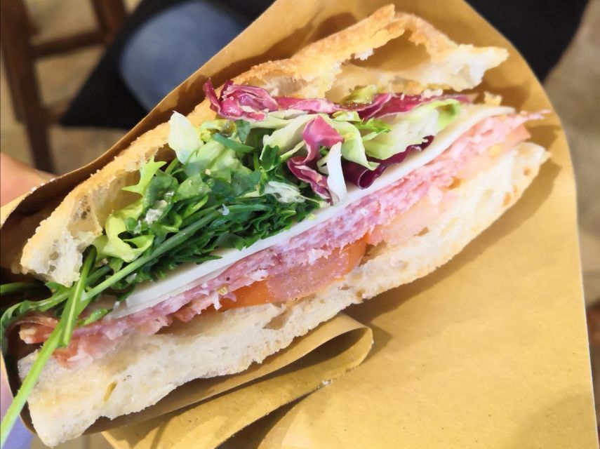 Florence: Street Food Walking Tour with Wine - Schiacciata, Tuscan wine, and savory stops