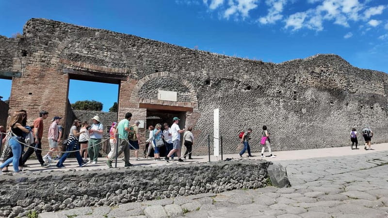 From Naples: Guided tour of Pompeii skip-the-line and round-trip train - Entering the archaeological site