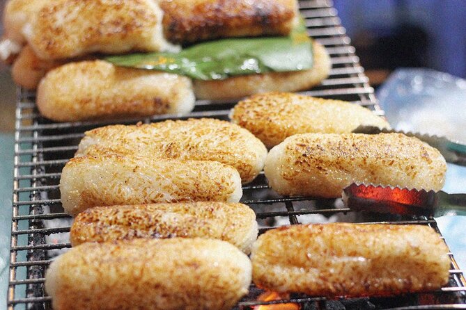 Ho Chi Minh City Street Food Tour & Sightseeing By Motorbike - Cambodian Market and local snacks
