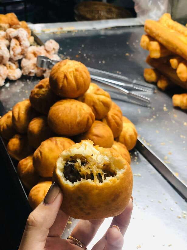 Ho Chi Minh City: Walking Food Tour with 13 Tastings - Ho Thi Ky Food Street and the flower market