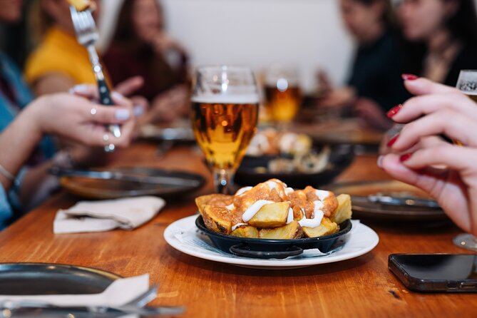 Lisbon: Award-Winning Guided Walking Food Tour with Local Drinks - Rua dos Fanqueiros: chouriço and codfish à Brás