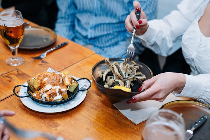 Lisbon: Award-Winning Guided Walking Food Tour with Local Drinks - Rua da Madalena: bifana, croqueta, and beer