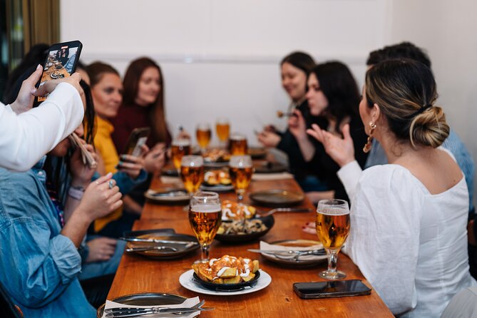 Lisbon: Award-Winning Guided Walking Food Tour with Local Drinks - Restauradores Square and the final pastel de nata