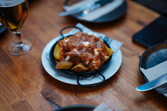 Lisbon: Award-Winning Guided Walking Food Tour with Local Drinks - Starting at the Supreme Court and walking into Baixa