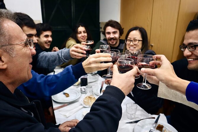 Lisbon Food Tour with 10+ Tastings of Local Delicacies & Wines - Mouraria, Baixa, and Alfama between bites