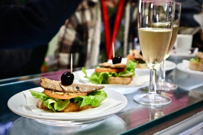 Lisbon Food Tour with 10+ Tastings of Local Delicacies & Wines - Sardines, fish, and the Portuguese pantry