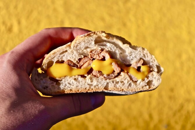 Lisbon Food Tour with 10+ Tastings of Local Delicacies & Wines - Petiscos and the pork sandwich