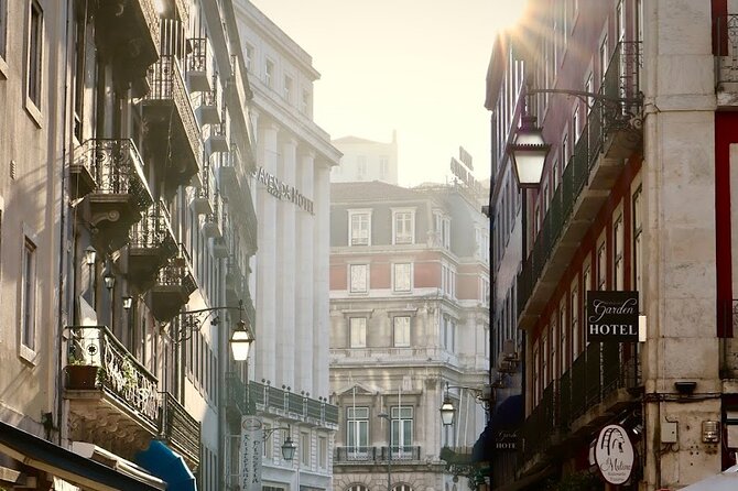 Lisbon Private Food Tour – Taste 10+ Local Dishes & Wines - Baixa, Santa Justa, and the move downhill