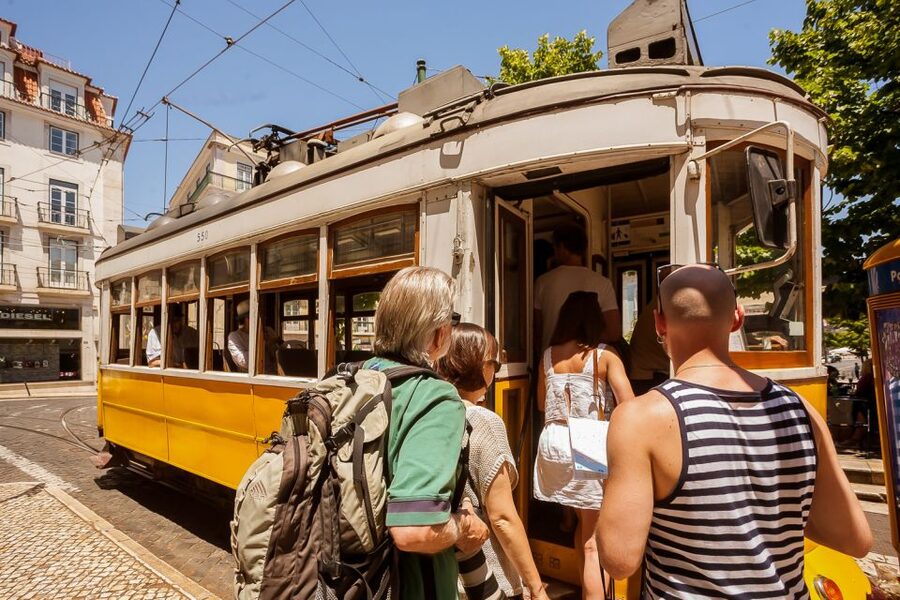 Lisbon Tram No. 28 Ride & Walking Tour - Leaving the tram for Alfama