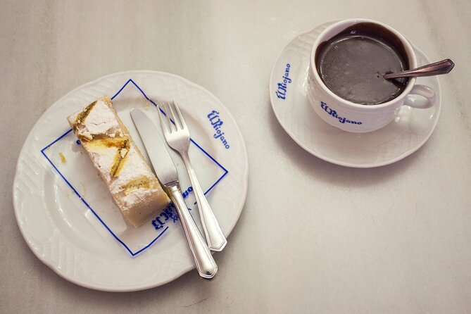 Madrid Historic Centre Food Tour with Authentic Tapas & Wines - Starting with pastry in a historic bakery