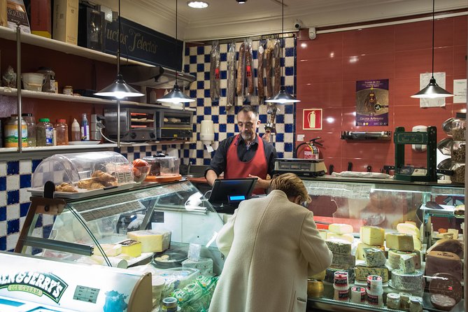 Madrid Tapas & Wine Tasting Walking Tour – Small Group Local Bars - Third stop: an open kitchen on Calle de la Cruz
