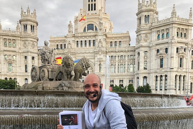 Madrid Walking Tour from Puerta del Sol to Retiro Park - The Metropolis Building and Gran Vía