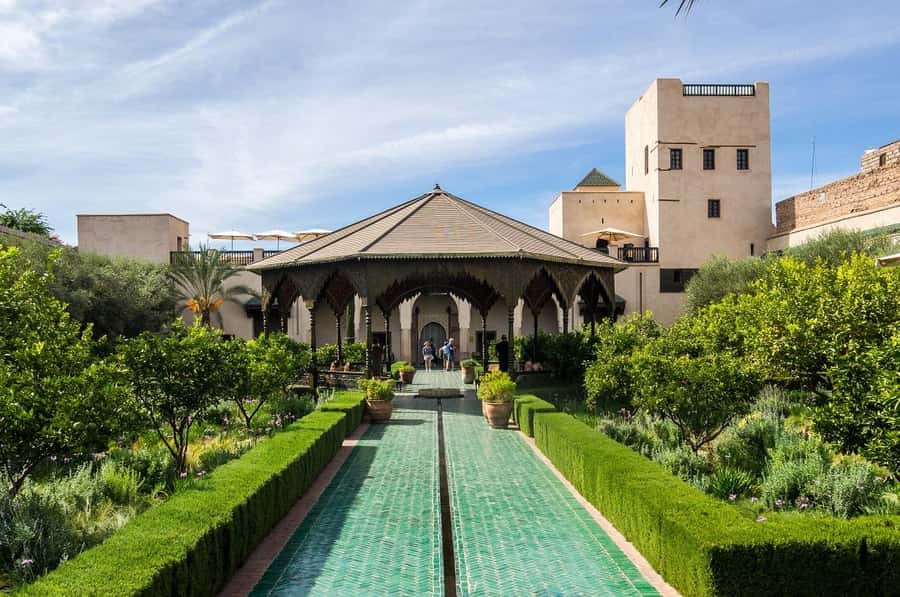 Marrakech: Ben Youssef, Secret Garden, & Souks Walking Tour - Starting at Café de France in Jemaa el-Fnaa
