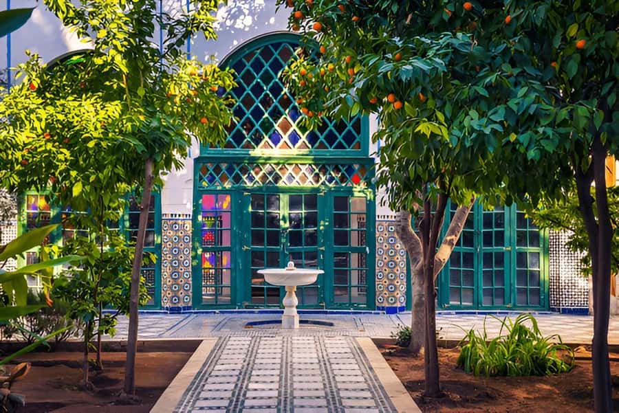 Marrakech: Ben Youssef, Secret Garden, & Souks Walking Tour - Timing, walking effort, and what to carry