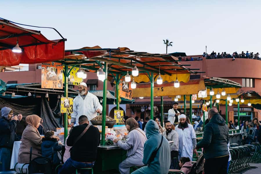 Marrakech: Medina by Night Walking Tour with Moroccan Tea - Shopping without losing the evening
