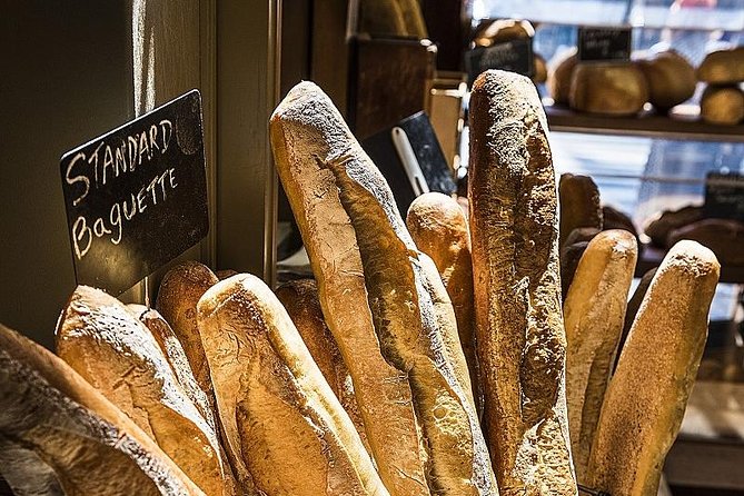 Montmartre Hidden Gems and Scenic Highlights Walking Tour - The man through the wall and Dalida’s square