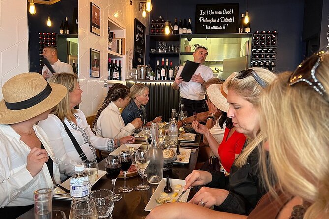 Montmartre Hill French Gourmet Food and Wine Tasting Walking Tour - Picasso, artists, and the village around Place du Tertre
