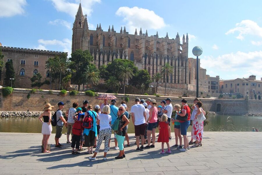 Palma de Mallorca: City Walking Tour with The Cathedral - Entering the Gothic cathedral through the Puerta Mayor