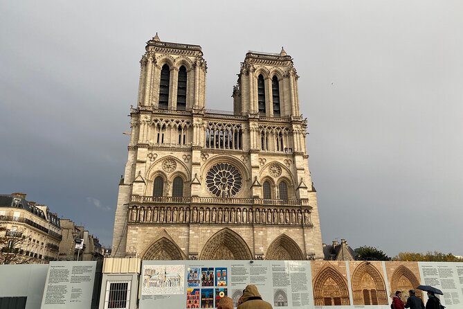 Paris: Île de la Cité and Notre-Dame Walking Tour With Crypt - Place Dauphine and the island’s royal character