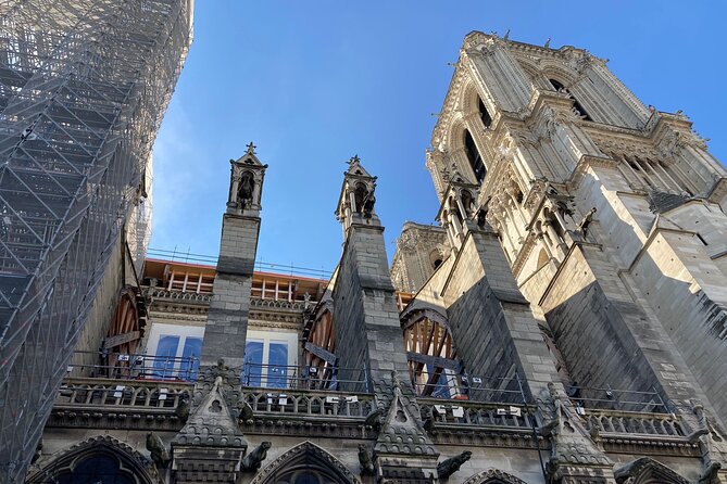 Paris: Île de la Cité and Notre-Dame Walking Tour With Crypt - Henri IV, the Seine, and Square du Vert-Galant