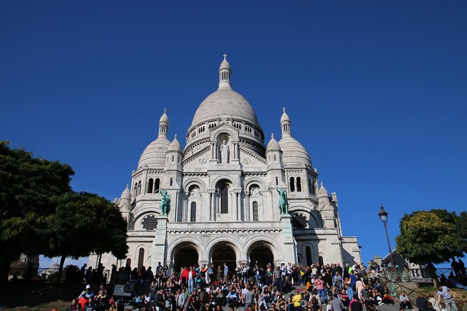 Paris Top Sights Half Day Walking Tour with a Fun Guide - Starting at Anvers and entering Sacré-Cœur