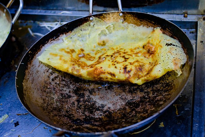 Private Street Food Evening Walking Tour in Ho Chi Minh City - Barbecue streets, beef in betel leaves, and noodle soup