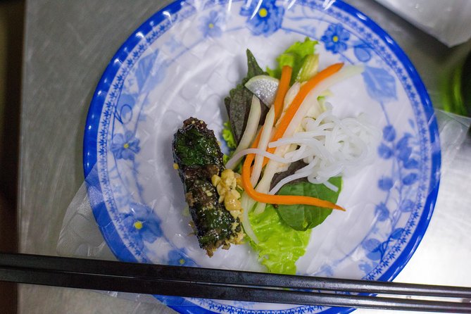 Private Street Food Evening Walking Tour in Ho Chi Minh City - The flower market and the city between meals