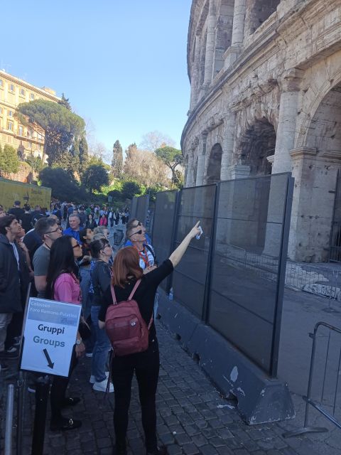 Rome: Colosseum, Palatine Hill, & Roman Forum Walking Tour - Walking through the Roman Forum