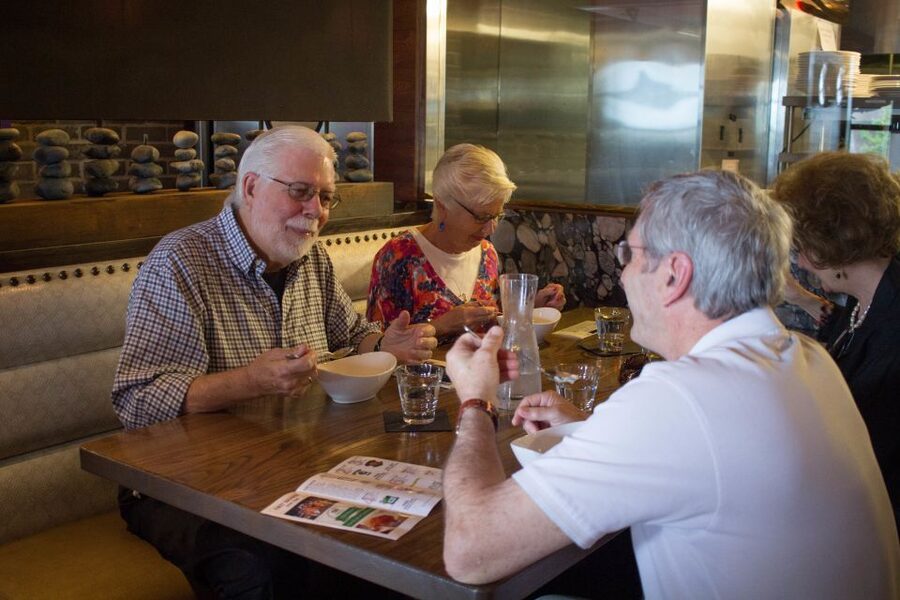 Savannah: Historic District Foodie Walking Tour - Walking through the Historic District between bites