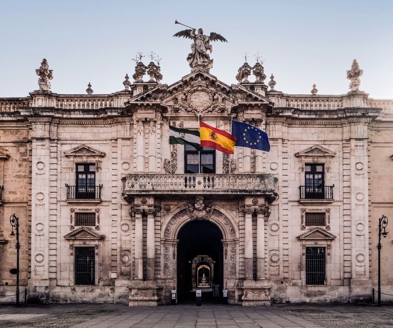 Seville: Small-Group City Highlights Walking Tour - Torre del Oro beside the Guadalquivir