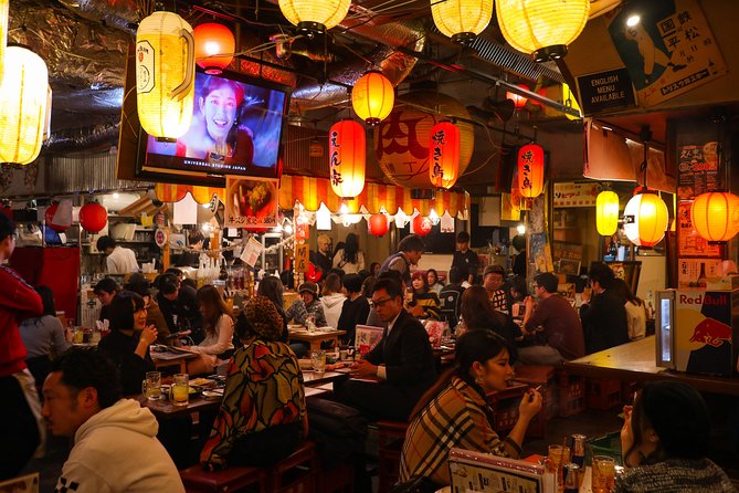 Shibuya Meltdown Nightlife Tour: All-You-Can-Drink Bar Hopping - Moving past Shibuya 109 into Center-gai