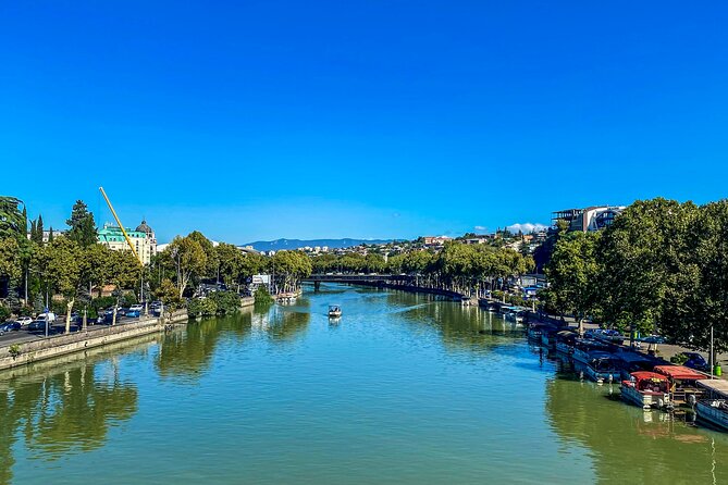 Tbilisi Walking Tour Including Cable Car and Traditional Bakery - Europe Square, Rike Park, and the river crossing
