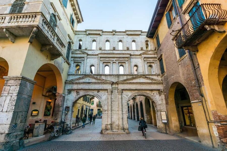 Verona: Small Group Guided Walking Tour with Arena Tickets - Piazza delle Erbe and Verona’s everyday center