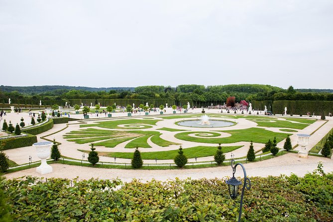 Versailles Château and Gardens Walking Tour - Tapis Vert and the first royal stories