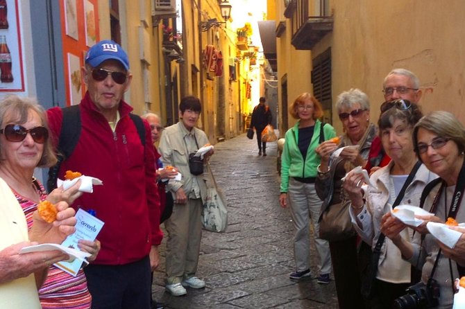 Walking Food Tour in Sorrento w/ Limoncello Factory Lemon Grove - Sitting down for pasta, salad, and wine