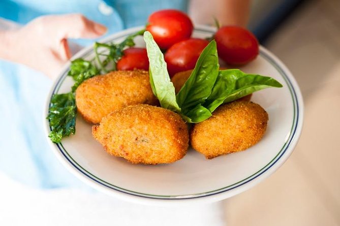 Walking Food Tour in Sorrento w/ Limoncello Factory Lemon Grove - Panini, pali’e riso, and the first savory stops